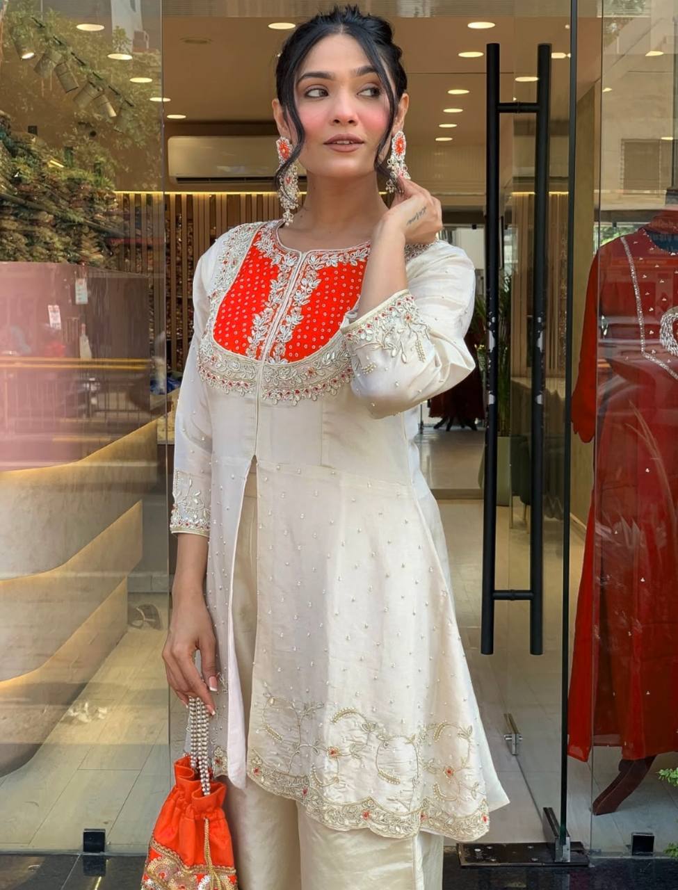 Elegant Off-White Embroidered Kurti with Purple Yoke & Sequin Detailing