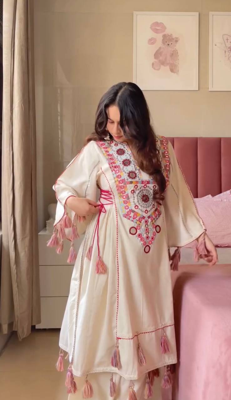 2-Piece Stylish Ensemble: Includes a well-fitted top and coordinated bottom