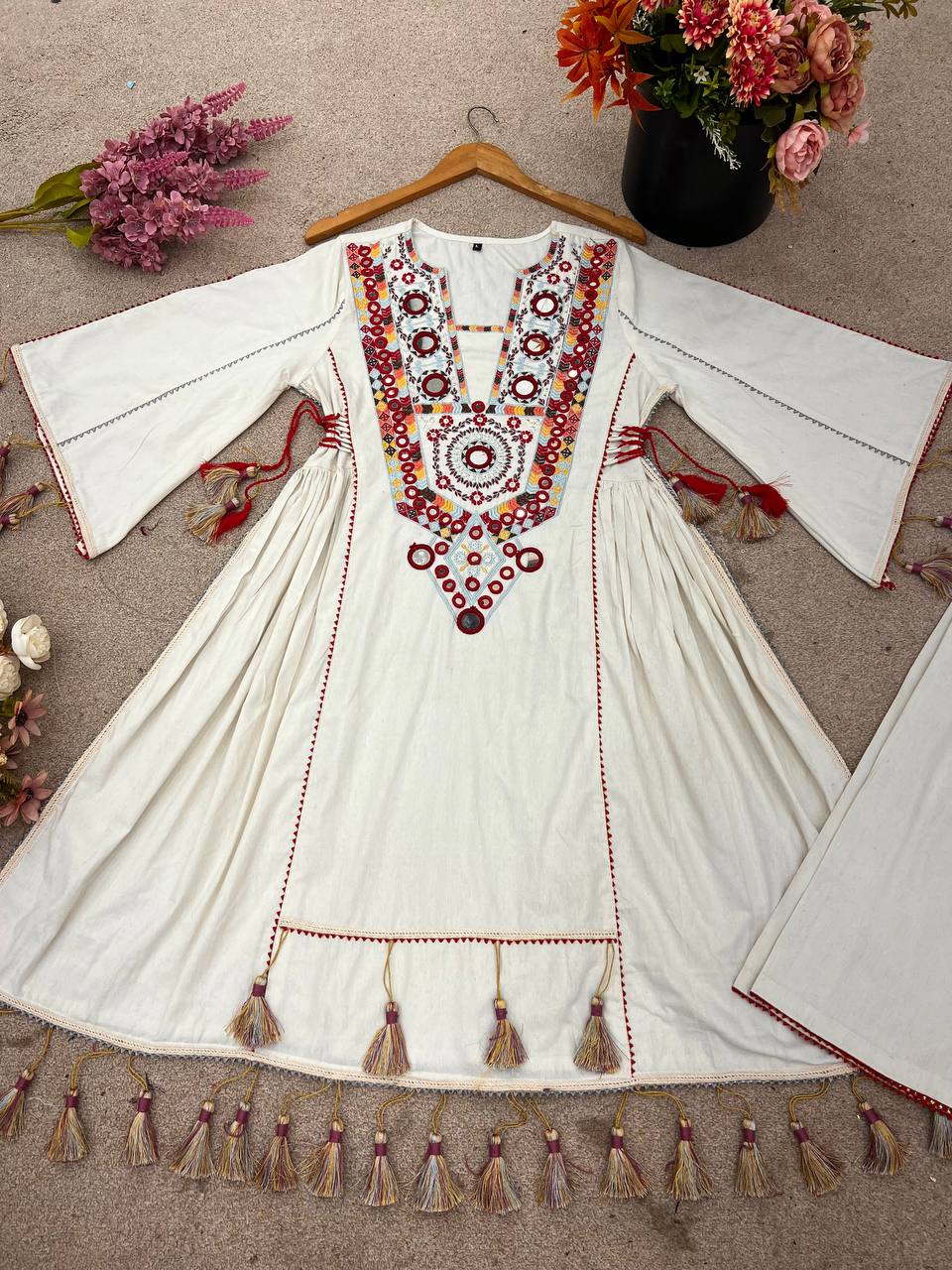 2-Piece Stylish Ensemble: Includes a well-fitted top and coordinated bottom