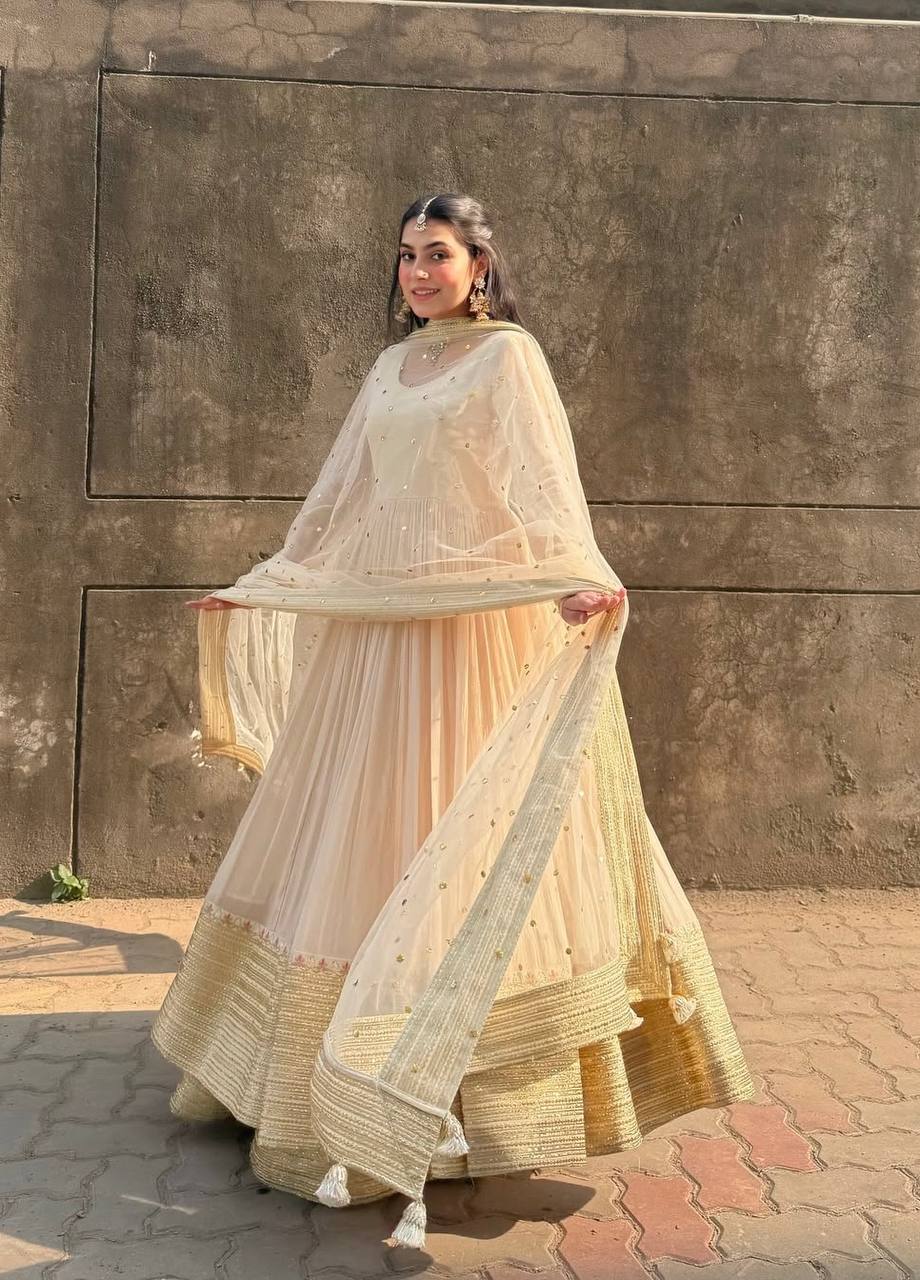 Elegant Ivory Anarkali with Golden Border & Sheer Dupatta