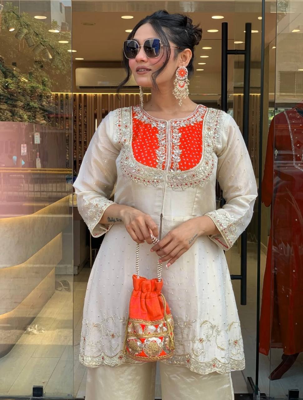 Elegant Off-White Embroidered Kurti with Purple Yoke & Sequin Detailing