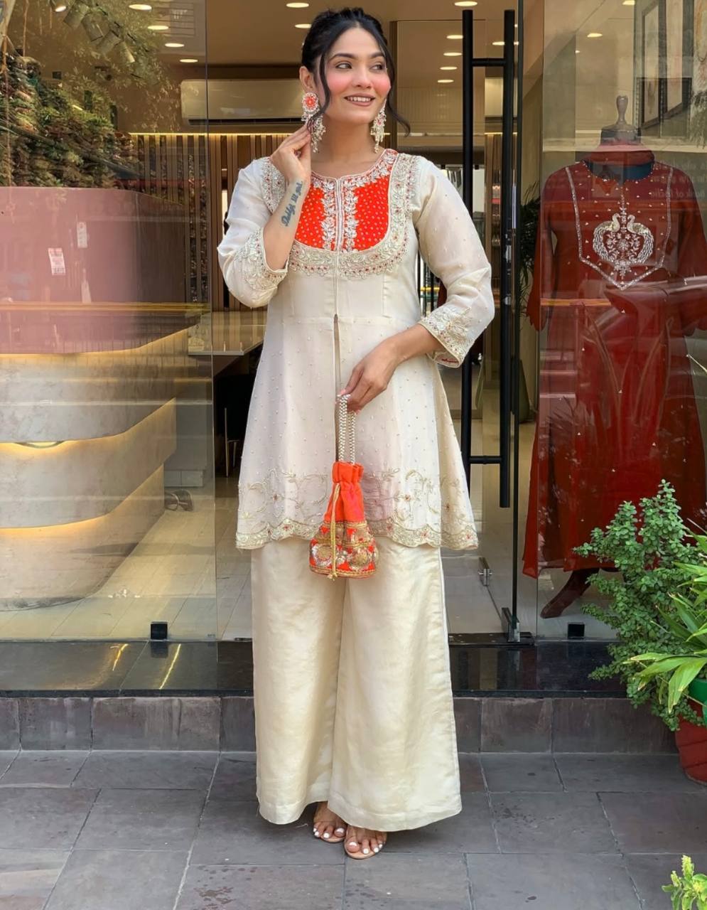 Elegant Off-White Embroidered Kurti with Purple Yoke & Sequin Detailing