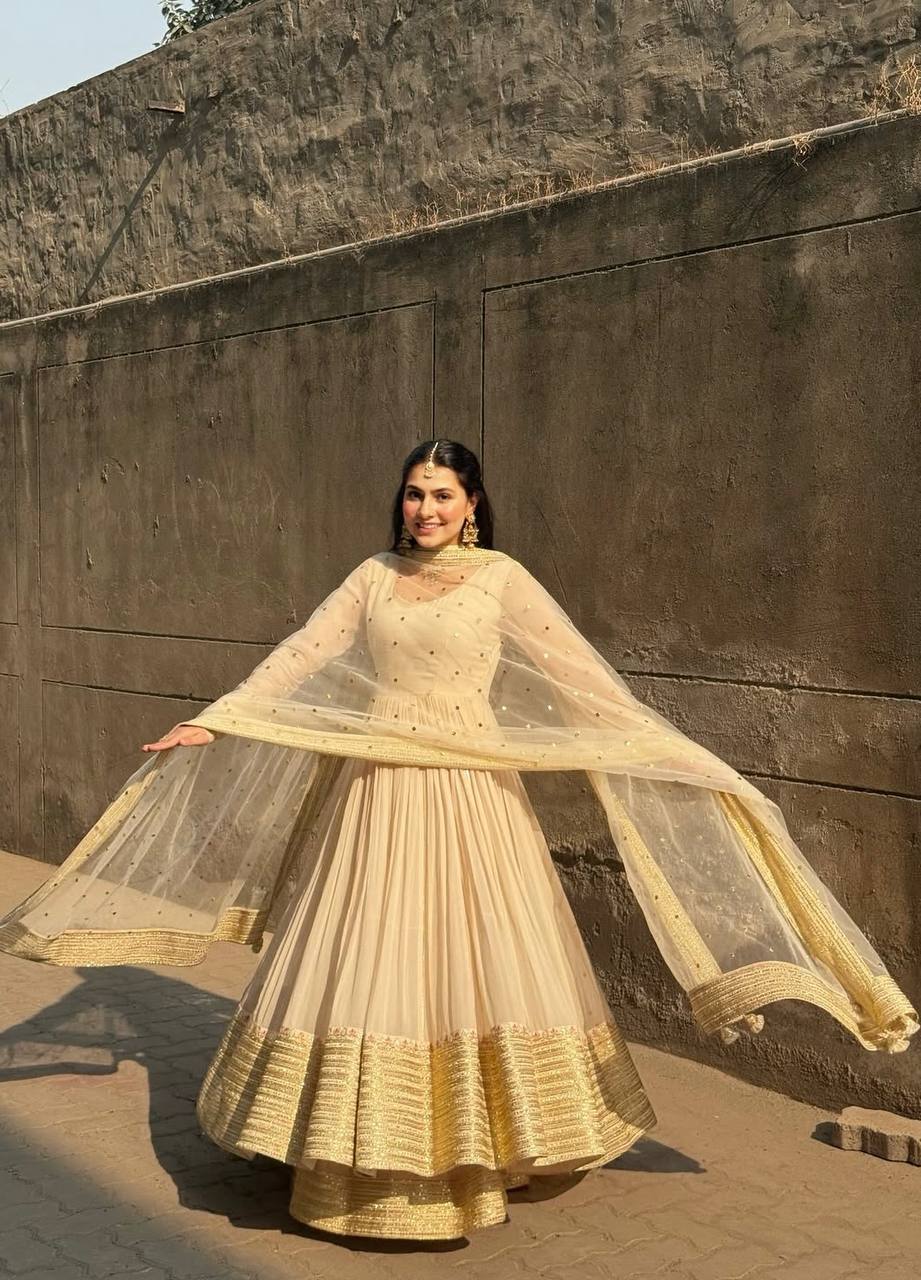 Elegant Ivory Anarkali with Golden Border & Sheer Dupatta